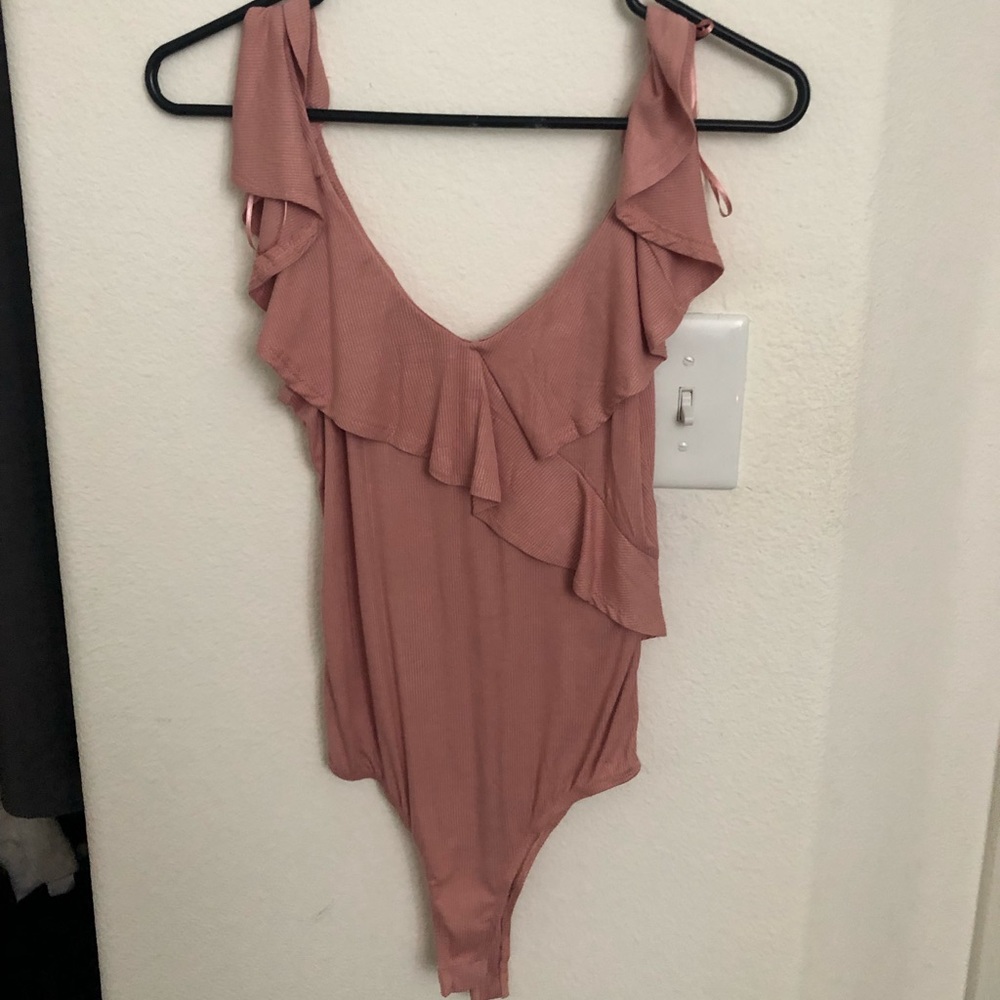 Blush pink “off the shoulder” body suit